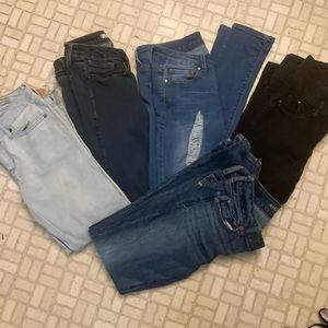 FIVE PAIRS OF WOMENS JEANS